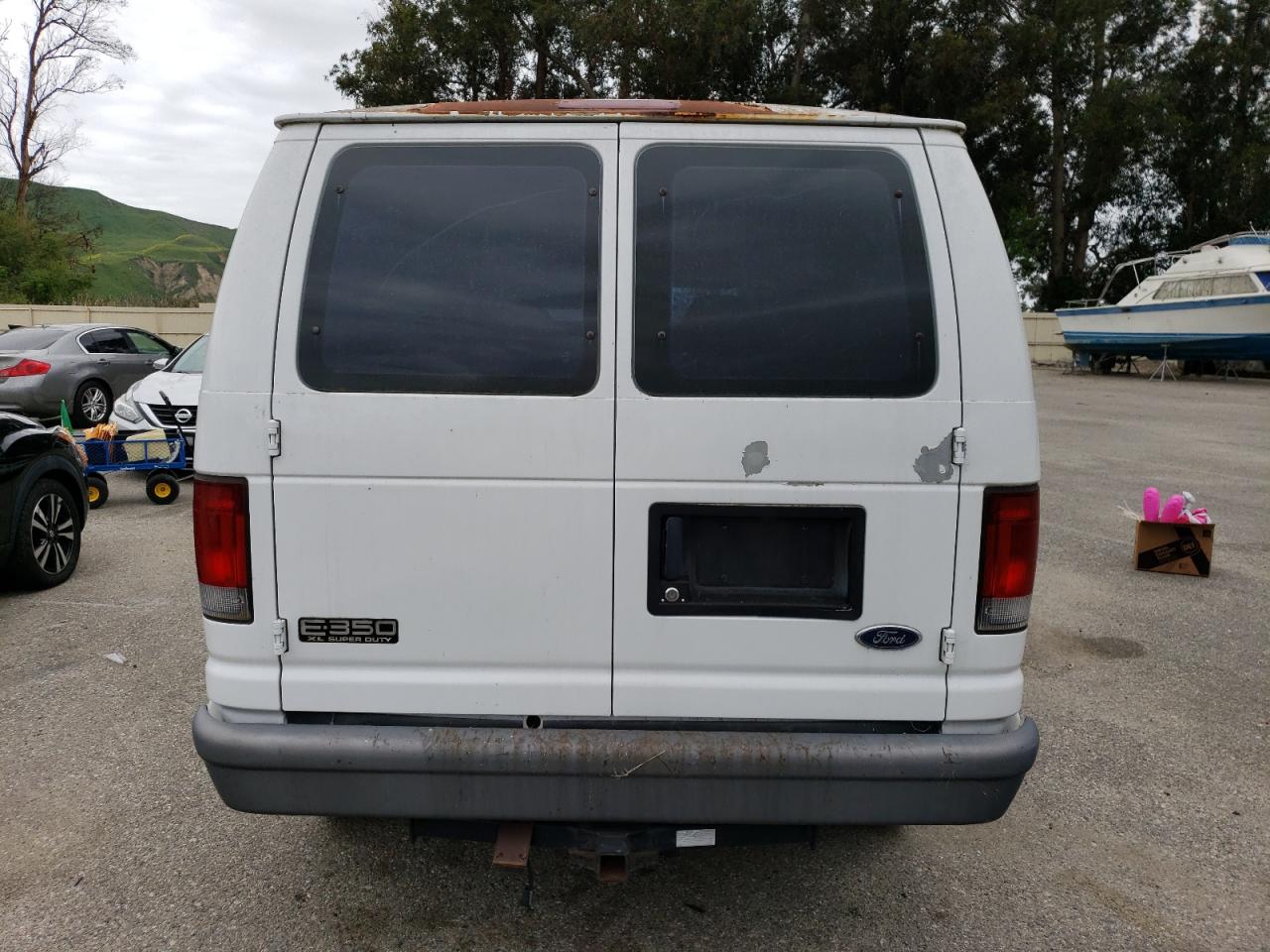 2004 Ford Econoline E350 Super Duty Wagon VIN: 1FBNE31L64HA33260 Lot: 46142784