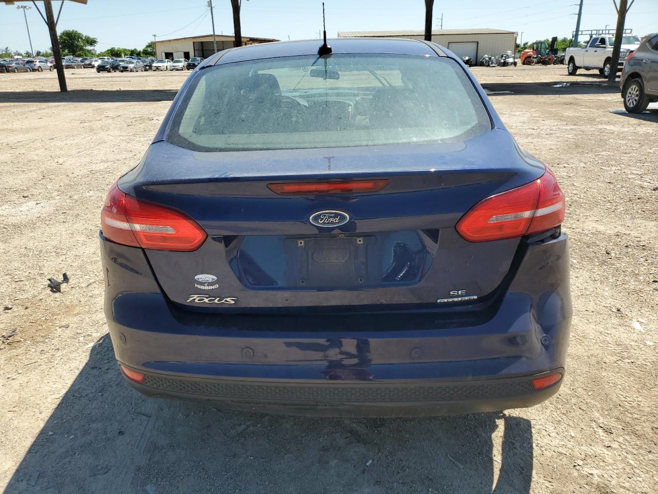 2016 Ford Focus Se VIN: 1FADP3F20GL310381 Lot: 51556654