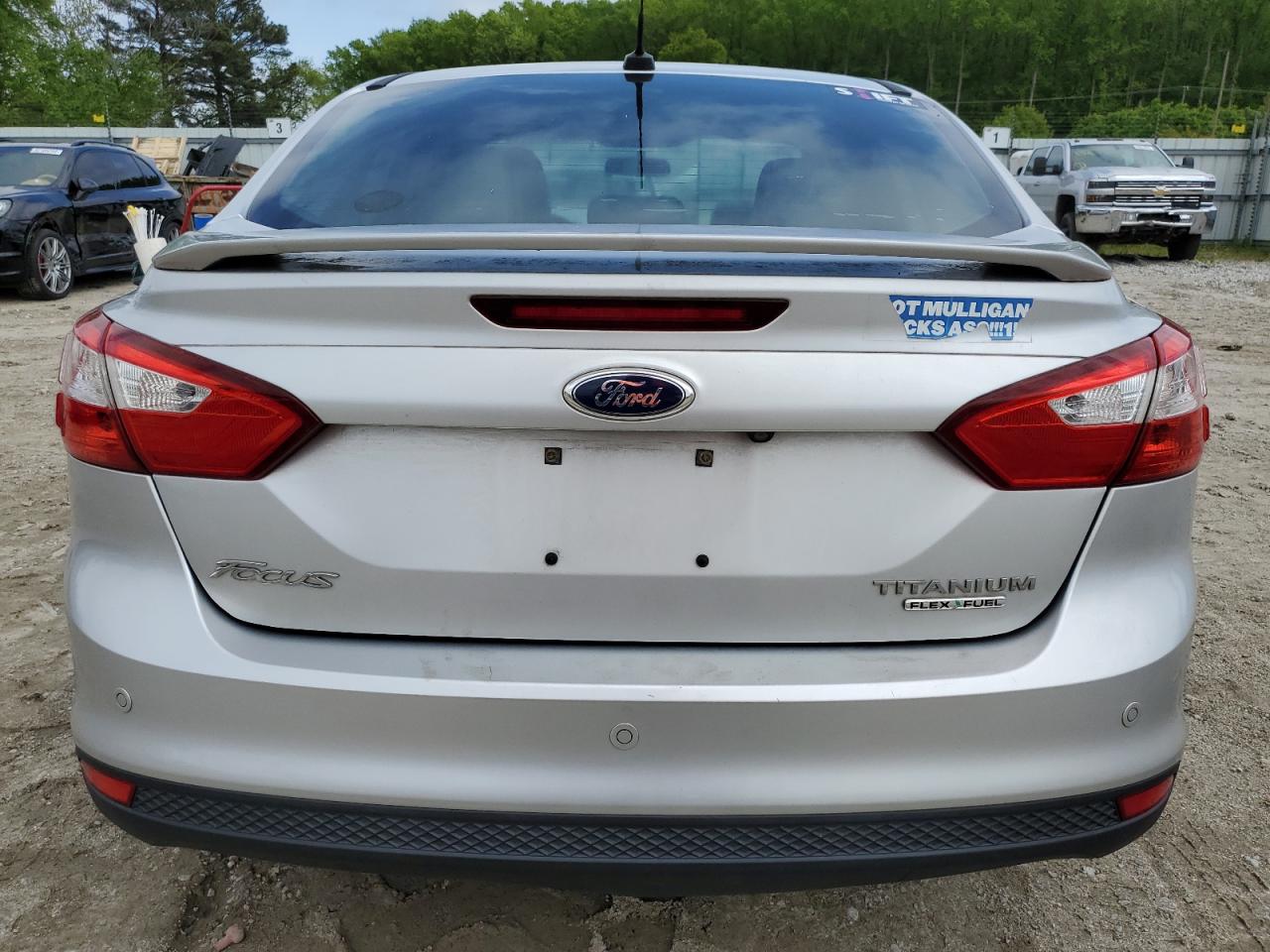 2014 Ford Focus Titanium VIN: 1FADP3J25EL227209 Lot: 50496594