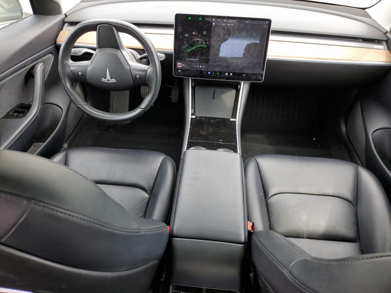 2018 Tesla Model 3 VIN: 5YJ3E1EAXJF021009 Lot: 50611084