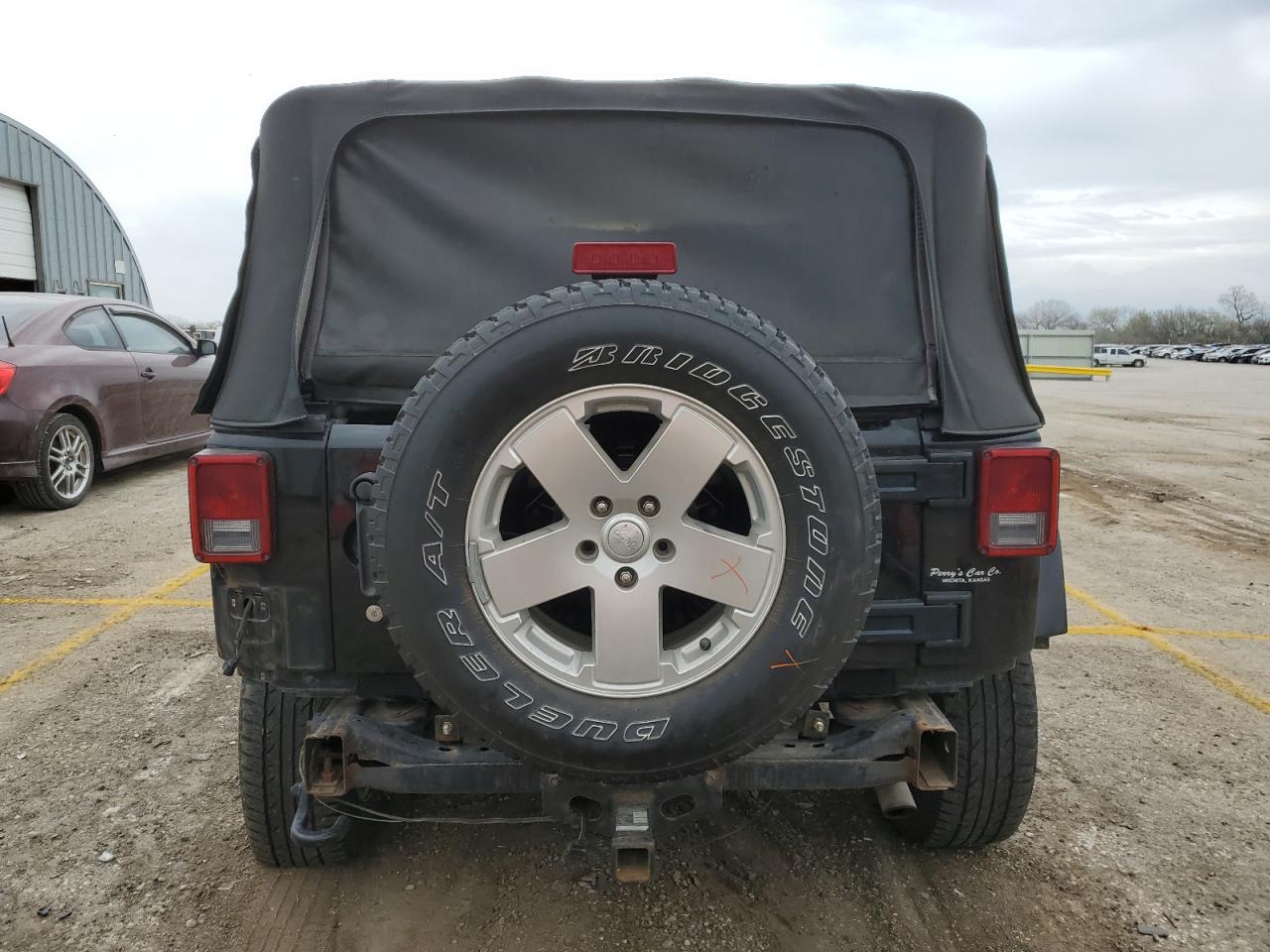 2010 Jeep Wrangler Sahara VIN: 1J4AA5D10AL207550 Lot: 49187124