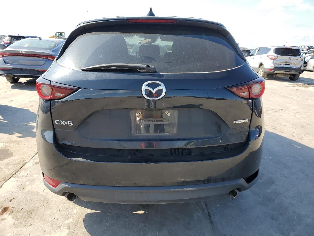 2020 Mazda Cx-5 Touring VIN: JM3KFACM3L0855041 Lot: 51960464