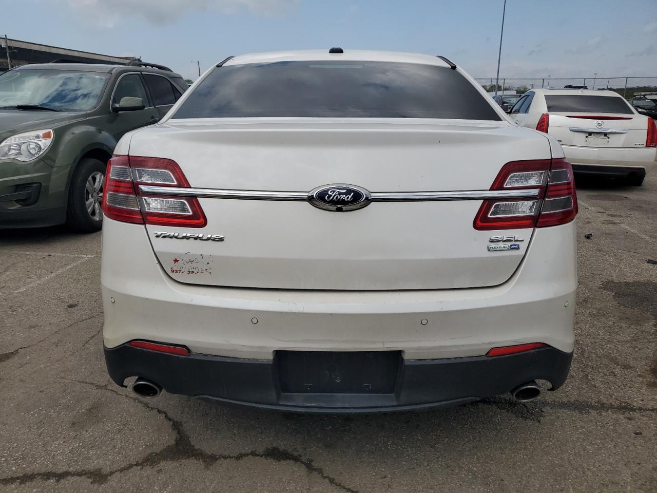 2015 Ford Taurus Sel VIN: 1FAHP2H80FG110704 Lot: 80485444