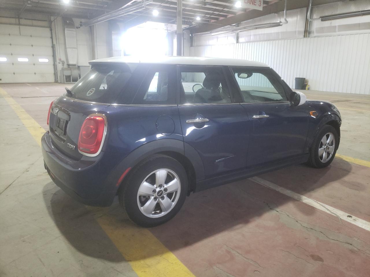 2017 Mini Cooper VIN: WMWXU1C31H2F77067 Lot: 52285944