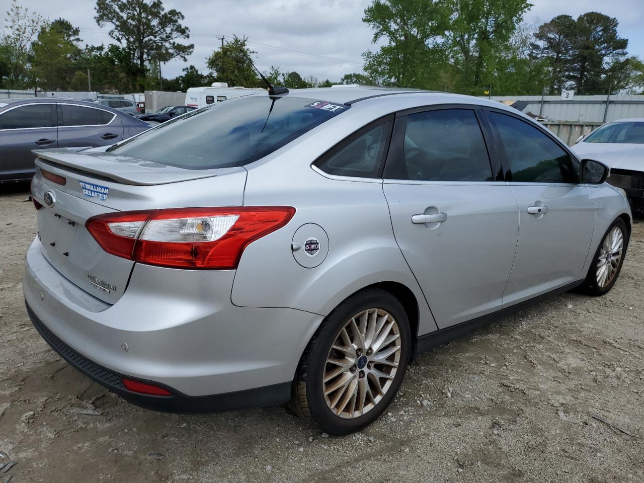 2014 Ford Focus Titanium VIN: 1FADP3J25EL227209 Lot: 50496594