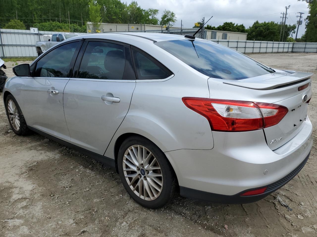 2014 Ford Focus Titanium VIN: 1FADP3J25EL227209 Lot: 50496594