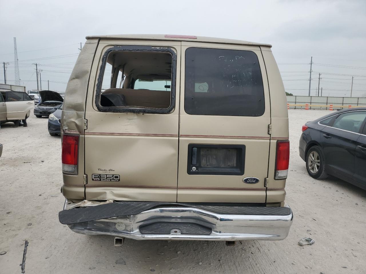 1999 Ford Econoline E350 Super Duty Wagon VIN: 1FBNE31S9XHB82919 Lot: 80476904