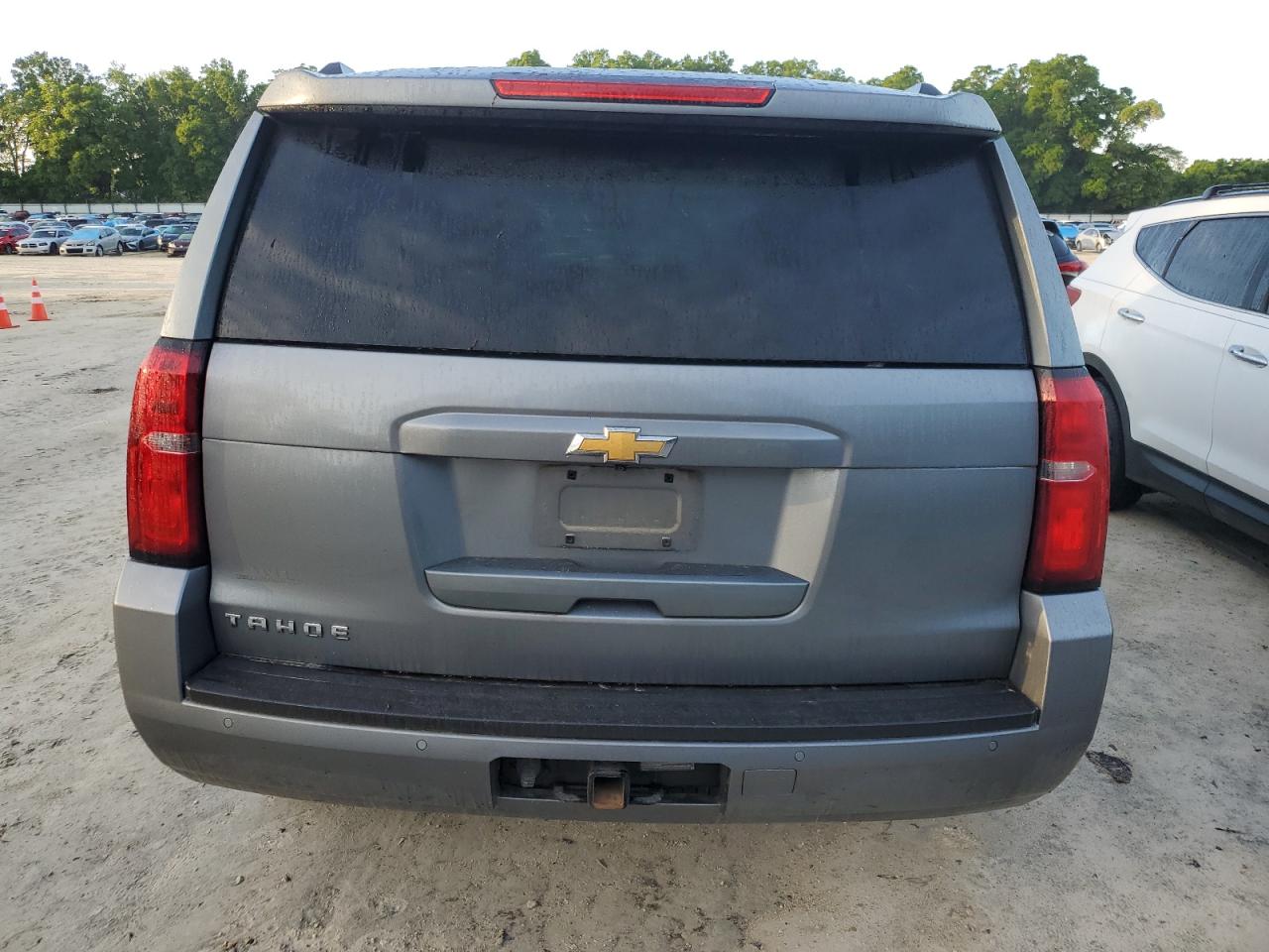 2019 Chevrolet Tahoe C1500 Lt VIN: 1GNSCBKCXKR242125 Lot: 48420154