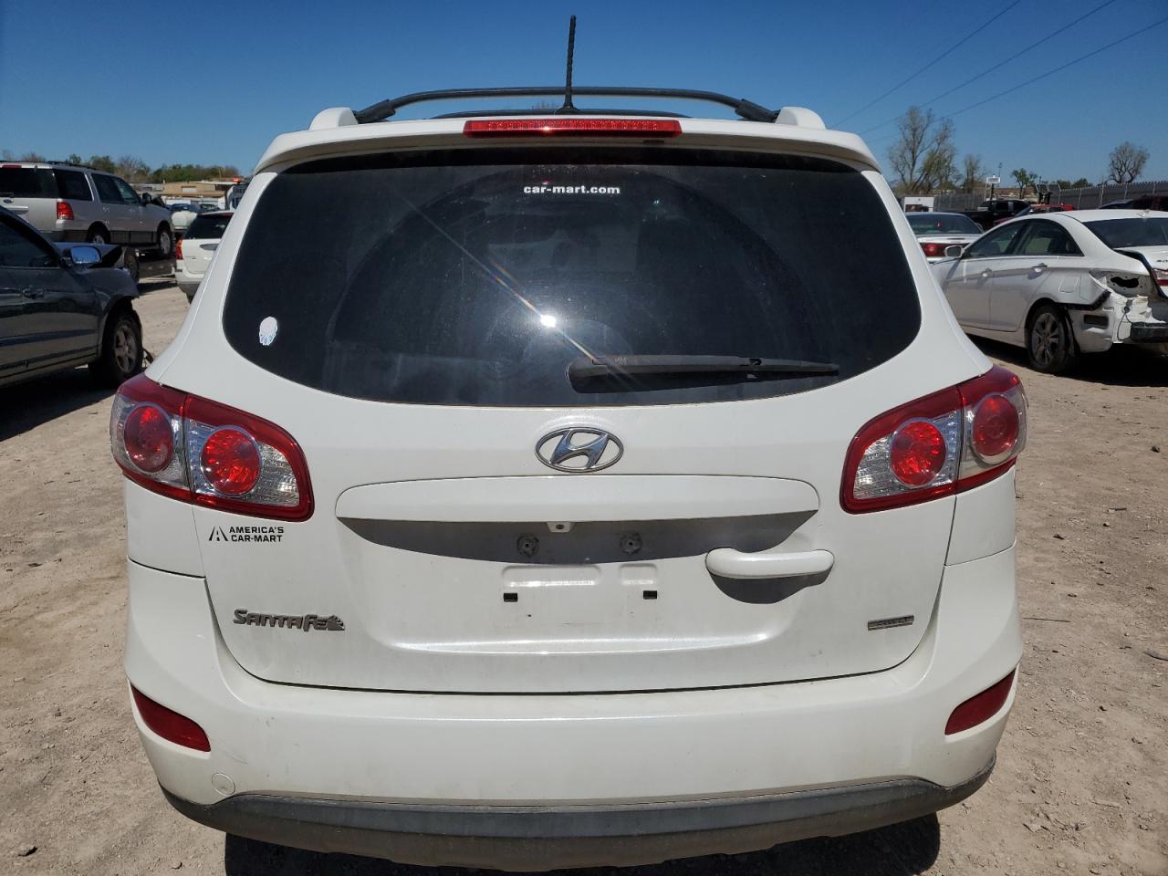 2012 Hyundai Santa Fe Se VIN: 5XYZHDAG8CG129427 Lot: 49350494