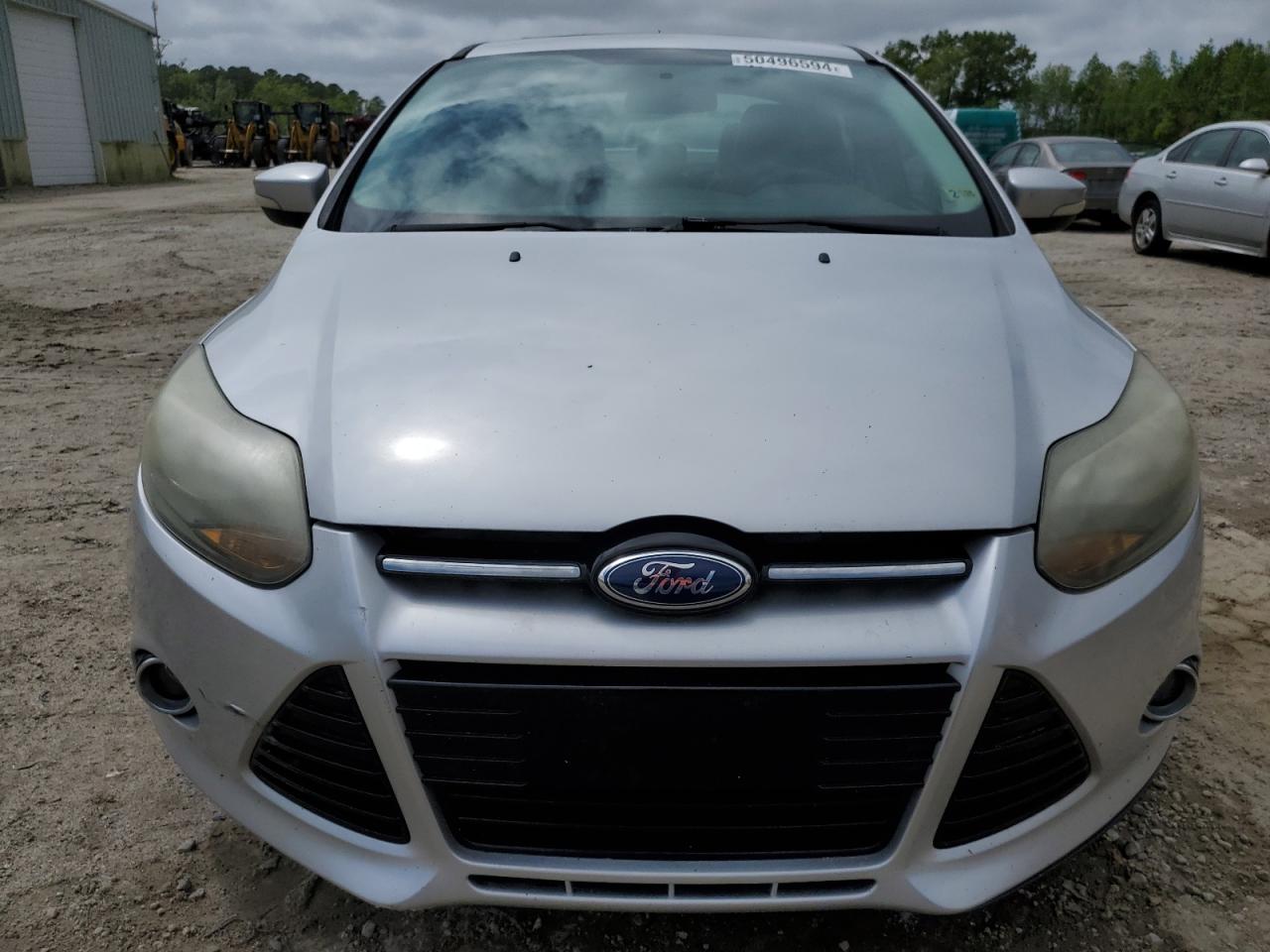 2014 Ford Focus Titanium VIN: 1FADP3J25EL227209 Lot: 50496594