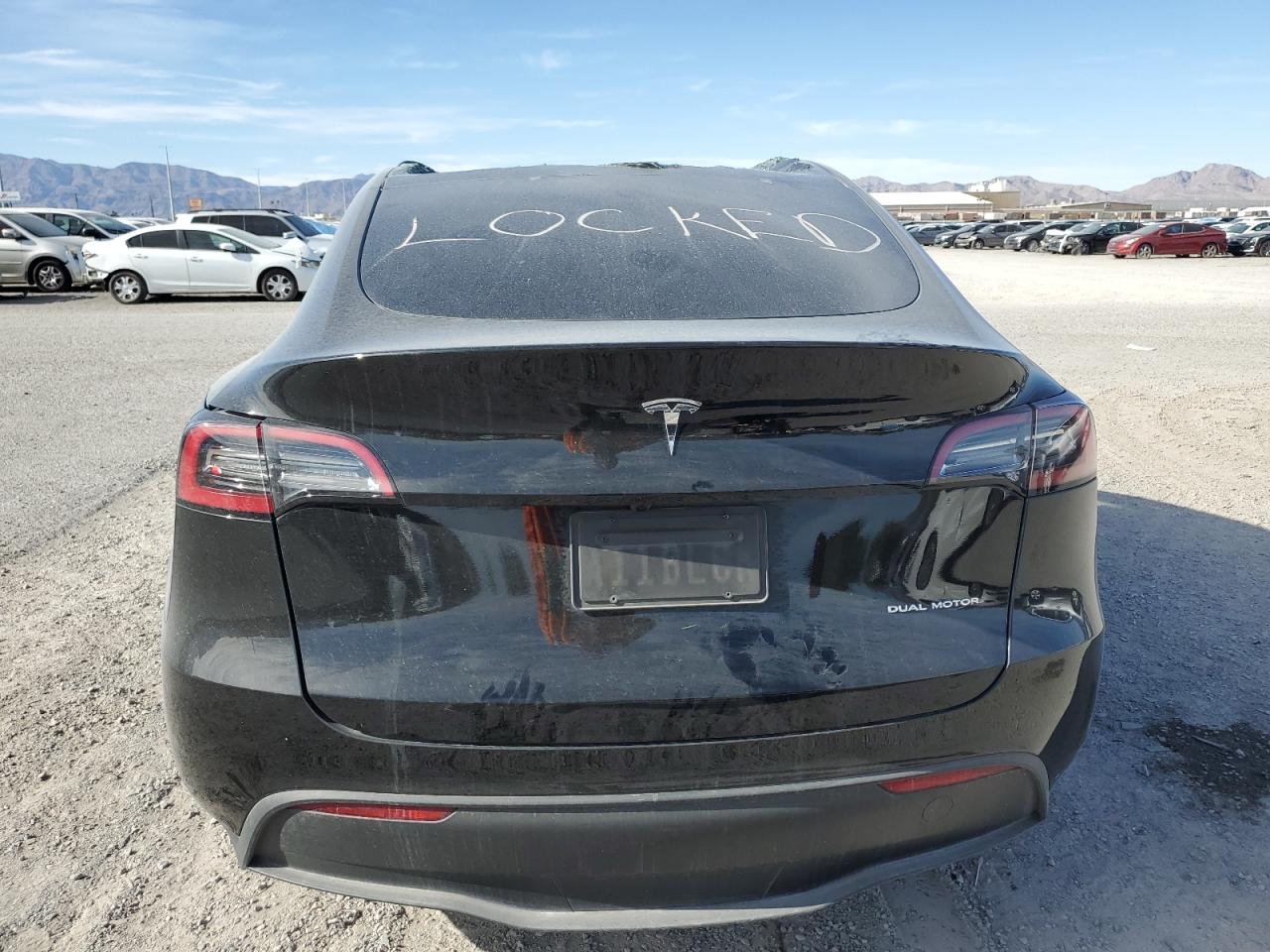 2023 Tesla Model Y VIN: 7SAYGAEE0PF886859 Lot: 71009714