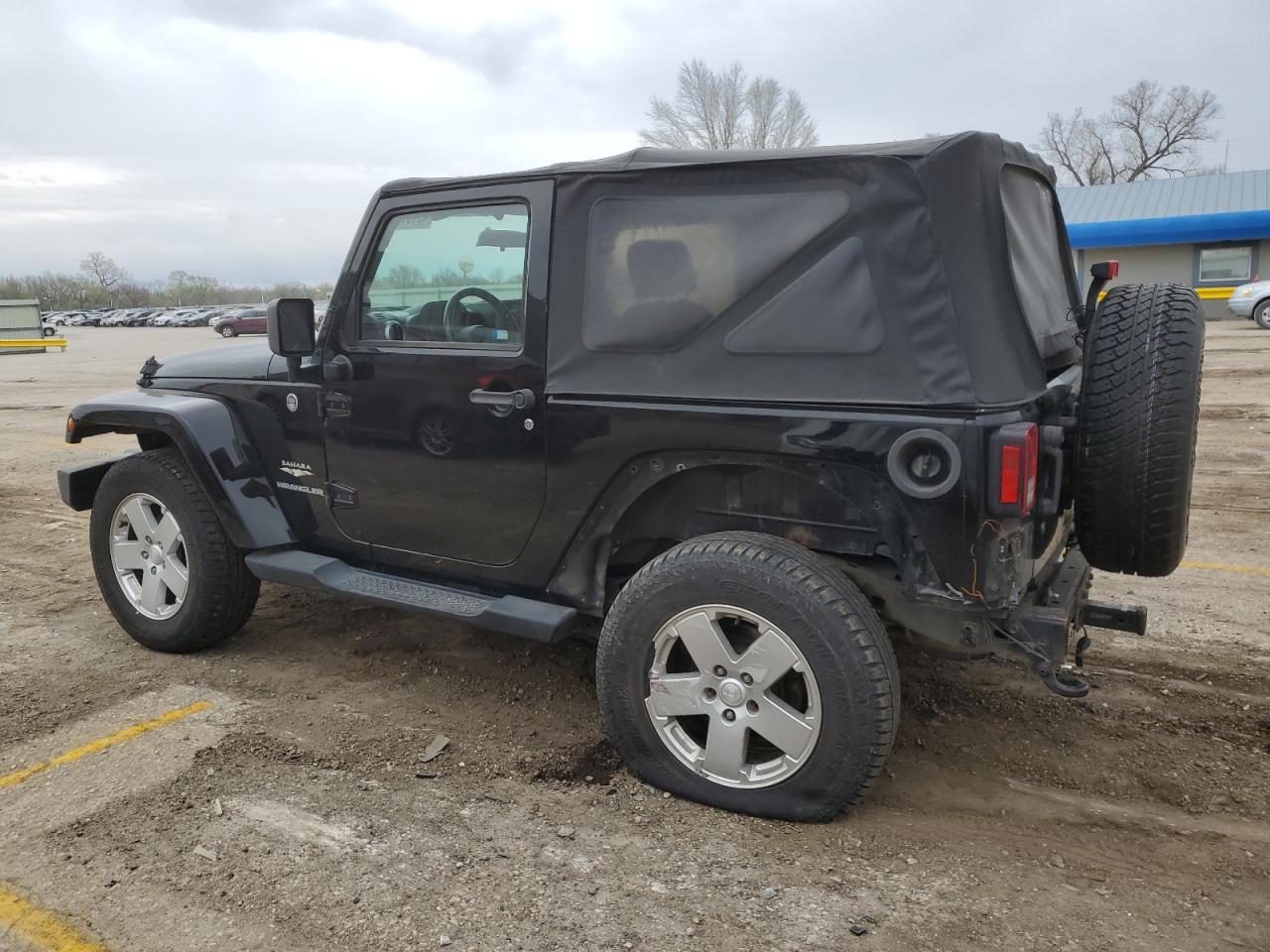 2010 Jeep Wrangler Sahara VIN: 1J4AA5D10AL207550 Lot: 49187124