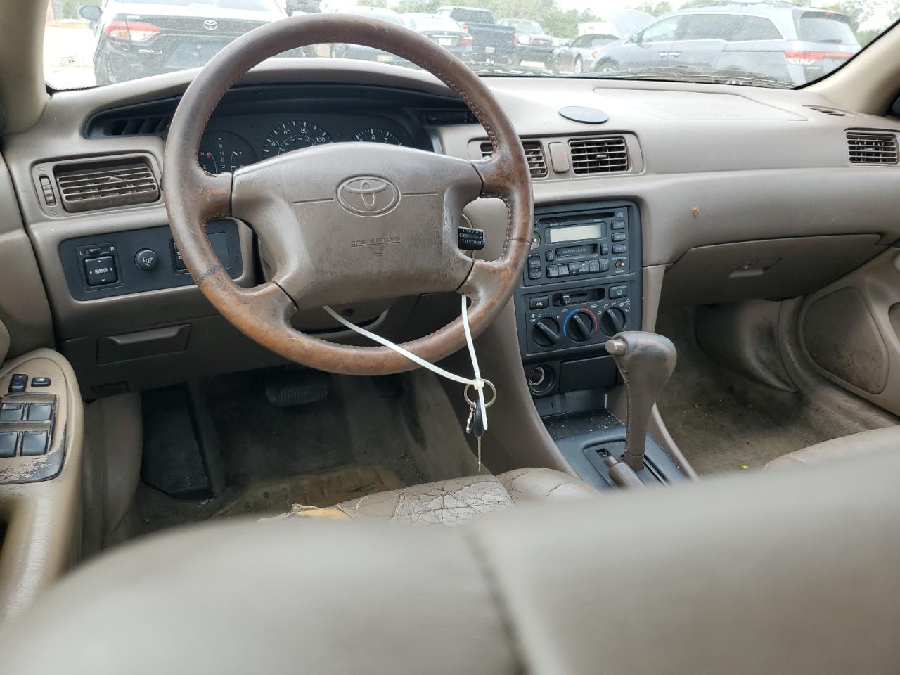 1999 Toyota Camry Le VIN: 4T1BF28K7XU086883 Lot: 80147134