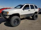 1999 Jeep Grand Cherokee Laredo na sprzedaż w Fresno, CA - Side