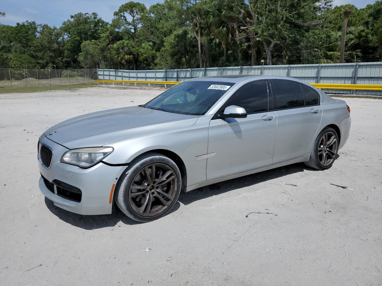 2013 Bmw 750 Xi продається в Fort Pierce, FL - Side