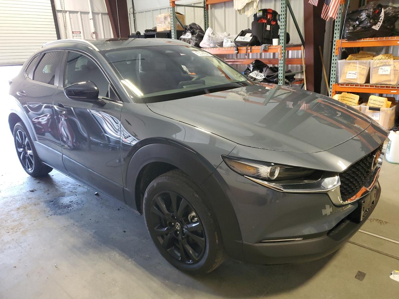 2025 MAZDA CX30 with SIDE damage, VIN 3MVDMBCM0SM809688