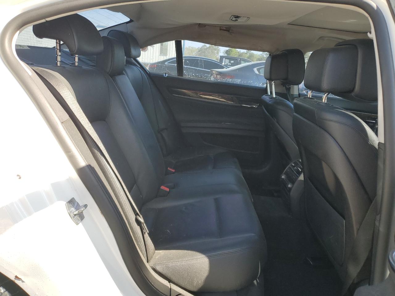 2014 BMW 740 I VIN: WBAYA6C58ED144242 Lot: 52522295