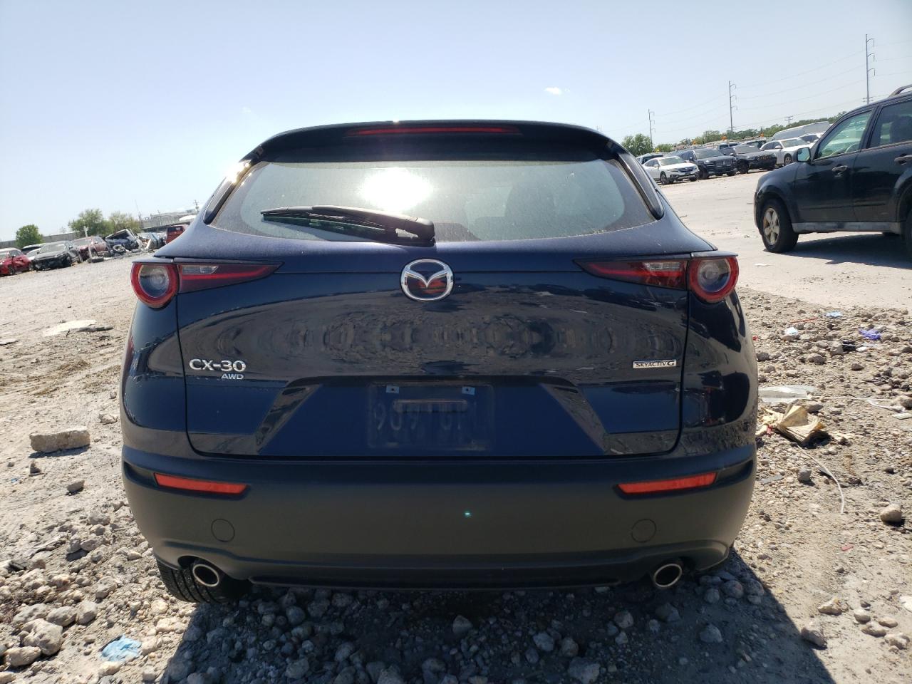 2023 Mazda Cx-30 VIN: 3MVDMBAM7PM520298 Lot: 52251295