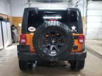 2011 Jeep Wrangler Unlimited Rubicon na sprzedaż w Kincheloe, MI - Top/Roof