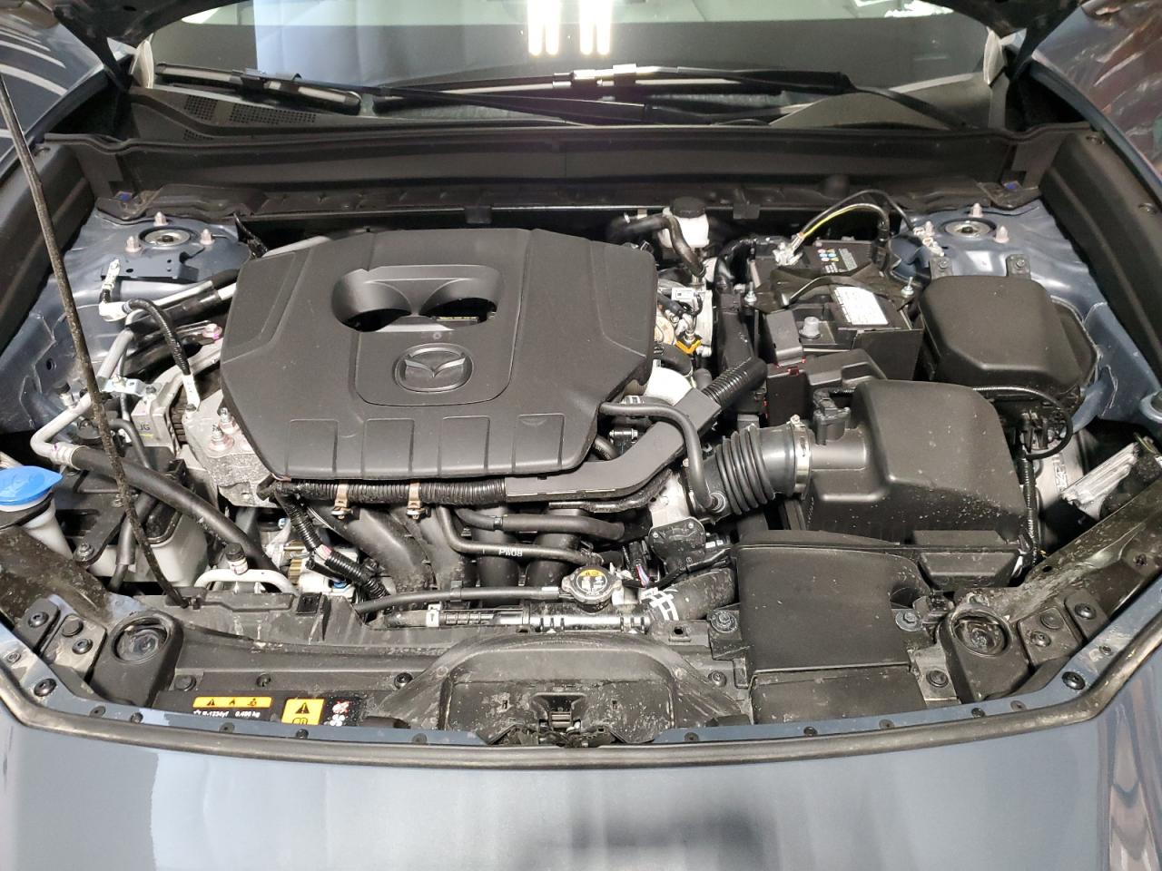 2025 MAZDA CX30 with SIDE damage, VIN 3MVDMBCM0SM809688