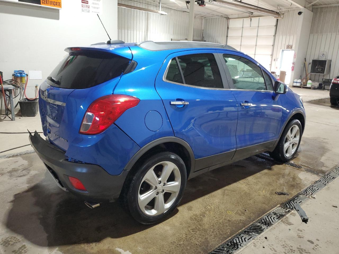 2015 BUICK ENCORE with REAR END damage, VIN KL4CJASBXFB210367