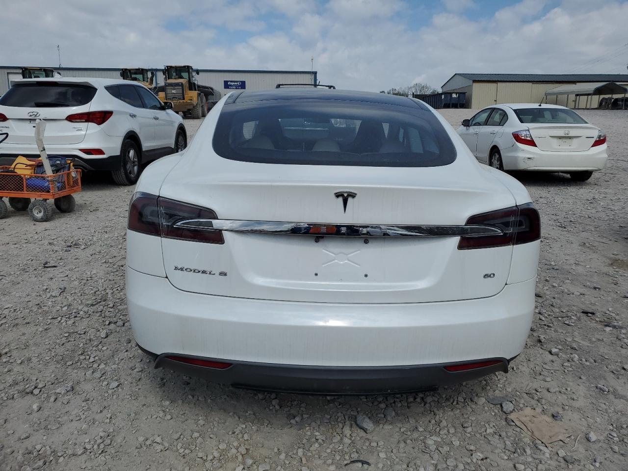 2014 Tesla Model S VIN: 5YJSA1S11EFP32051 Lot: 51921385