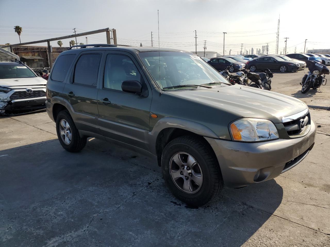2002 Mazda Tribute Lx VIN: 4F2YU08112KM16716 Lot: 55095645