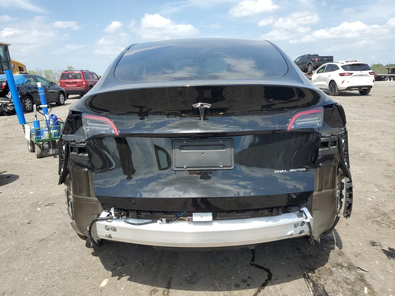 2023 Tesla Model Y VIN: 7SAYGDEE8PA115063 Lot: 53745755