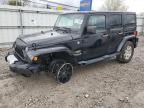 2013 Jeep Wrangler Unlimited Sahara للبيع في Walton، KY - Front End