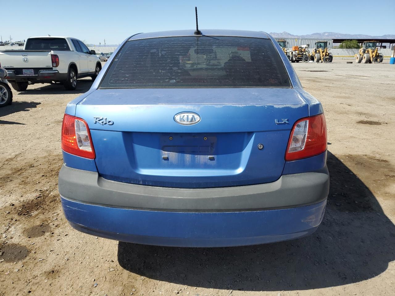 2009 Kia Rio Base VIN: KNADE223096571999 Lot: 54889575
