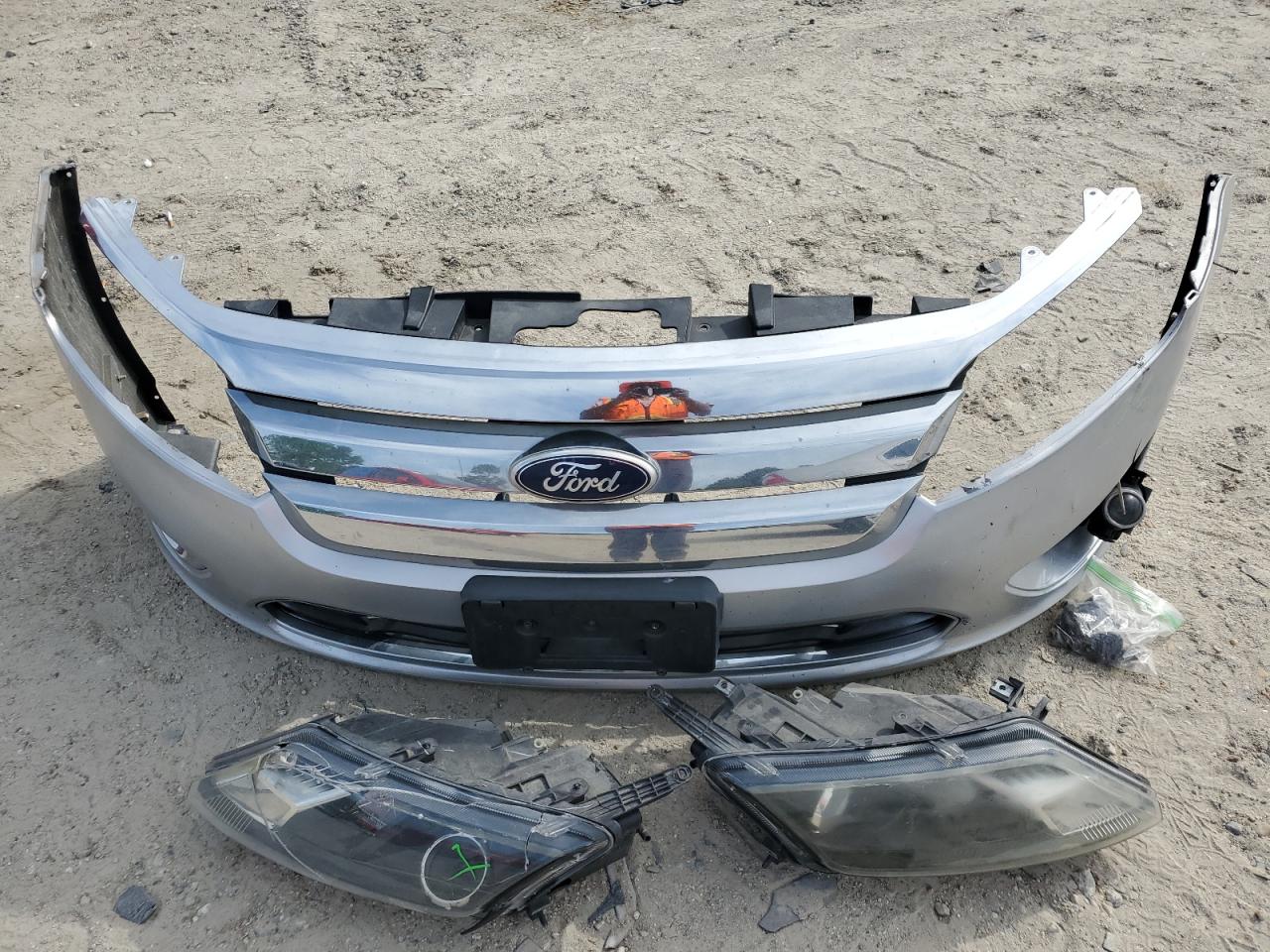 2010 Ford Fusion Hybrid VIN: 3FADP0L39AR412573 Lot: 54019145