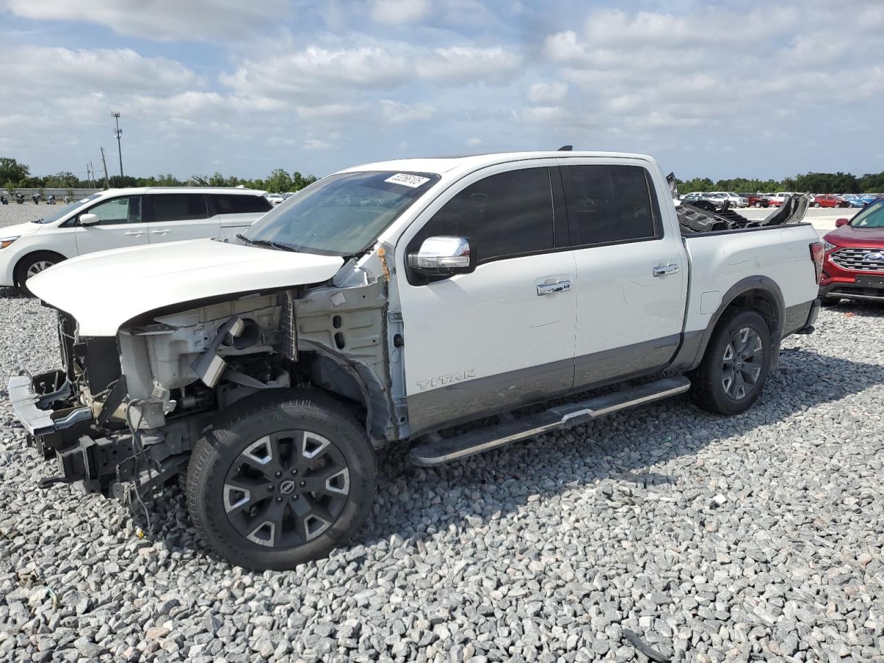 1N6AA1ED9PN104385 NISSAN TITAN Photo 1