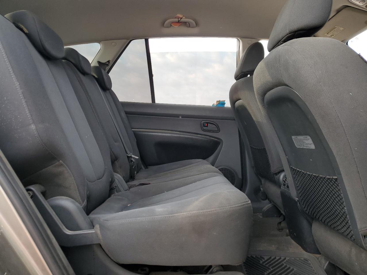 2009 Kia Rondo Base VIN: KNAFG528X97241832 Lot: 53323895