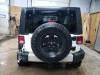 2014 Jeep Wrangler Unlimited Sahara იყიდება Kincheloe-ში, MI - Side
