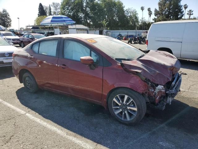  NISSAN VERSA 2024 Червоний