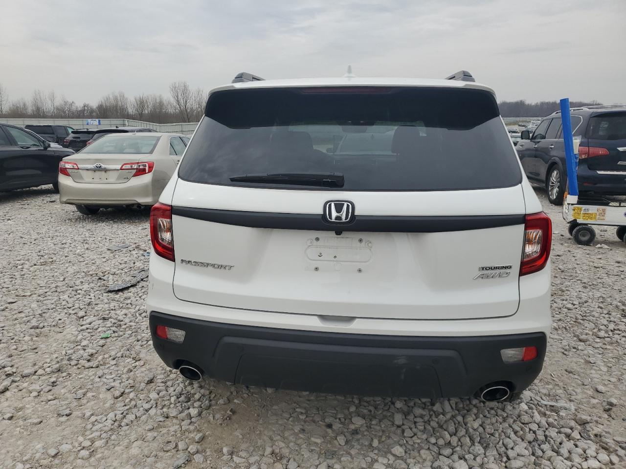 2021 Honda Passport Touring VIN: 5FNYF8H94MB001856 Lot: 53511485
