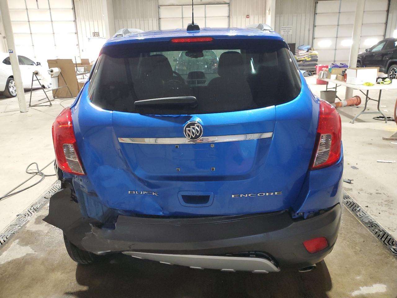 2015 BUICK ENCORE with REAR END damage, VIN KL4CJASBXFB210367