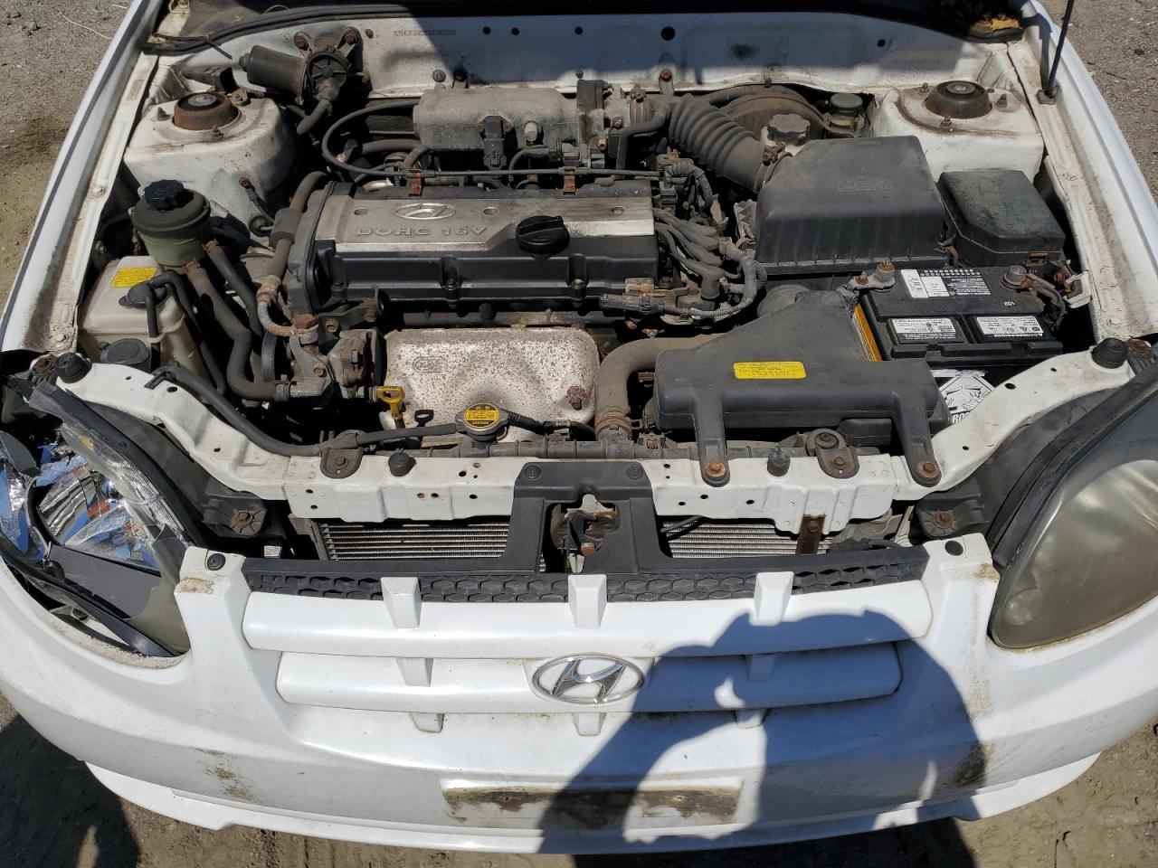 2003 Hyundai Accent L VIN: KMHCF35C53U240220 Lot: 52581415
