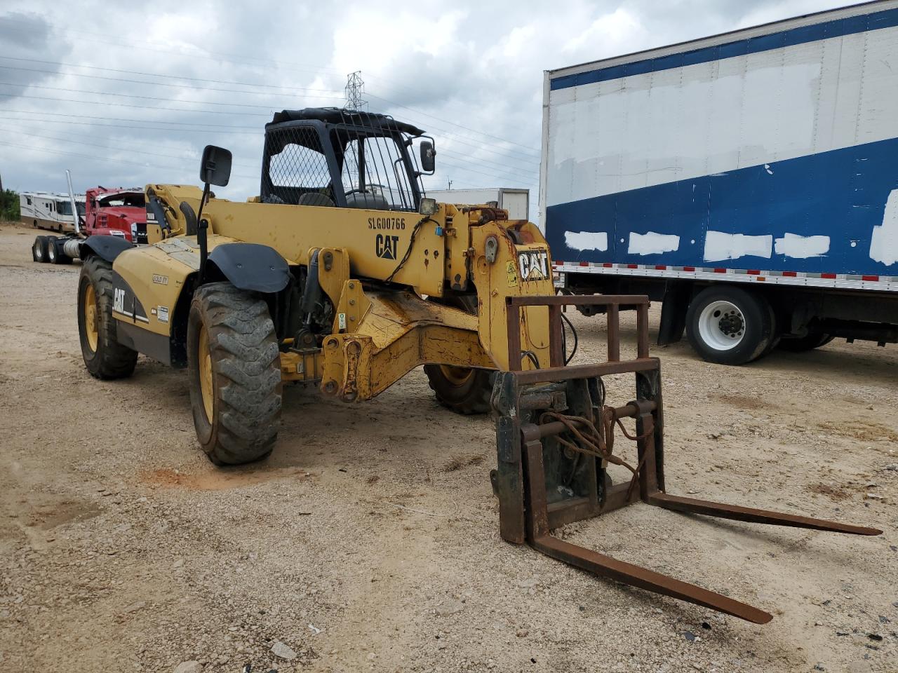 2000 Caterillar Th560B Telehandler for Sale in China Grove, NC - Side