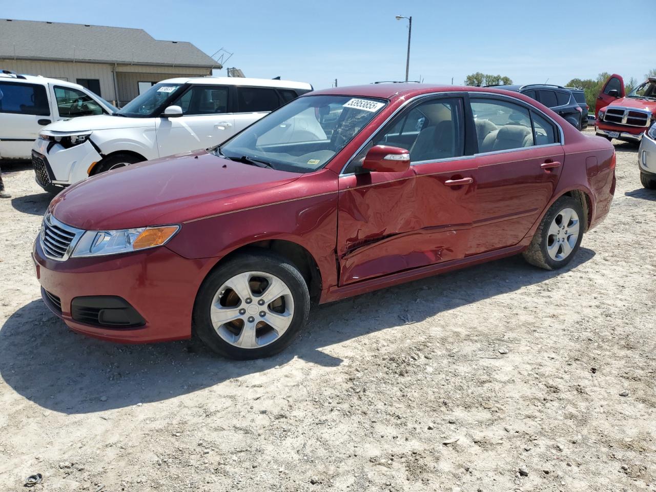 2009 Kia Optima Lx zu verkaufen in Columbia, MO - Side