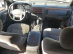 1999 Jeep Grand Cherokee Laredo na sprzedaż w Fresno, CA - Side