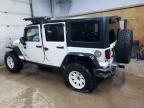 2014 Jeep Wrangler Unlimited Sahara იყიდება Kincheloe-ში, MI - Side