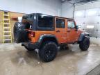 2011 Jeep Wrangler Unlimited Rubicon na sprzedaż w Kincheloe, MI - Top/Roof
