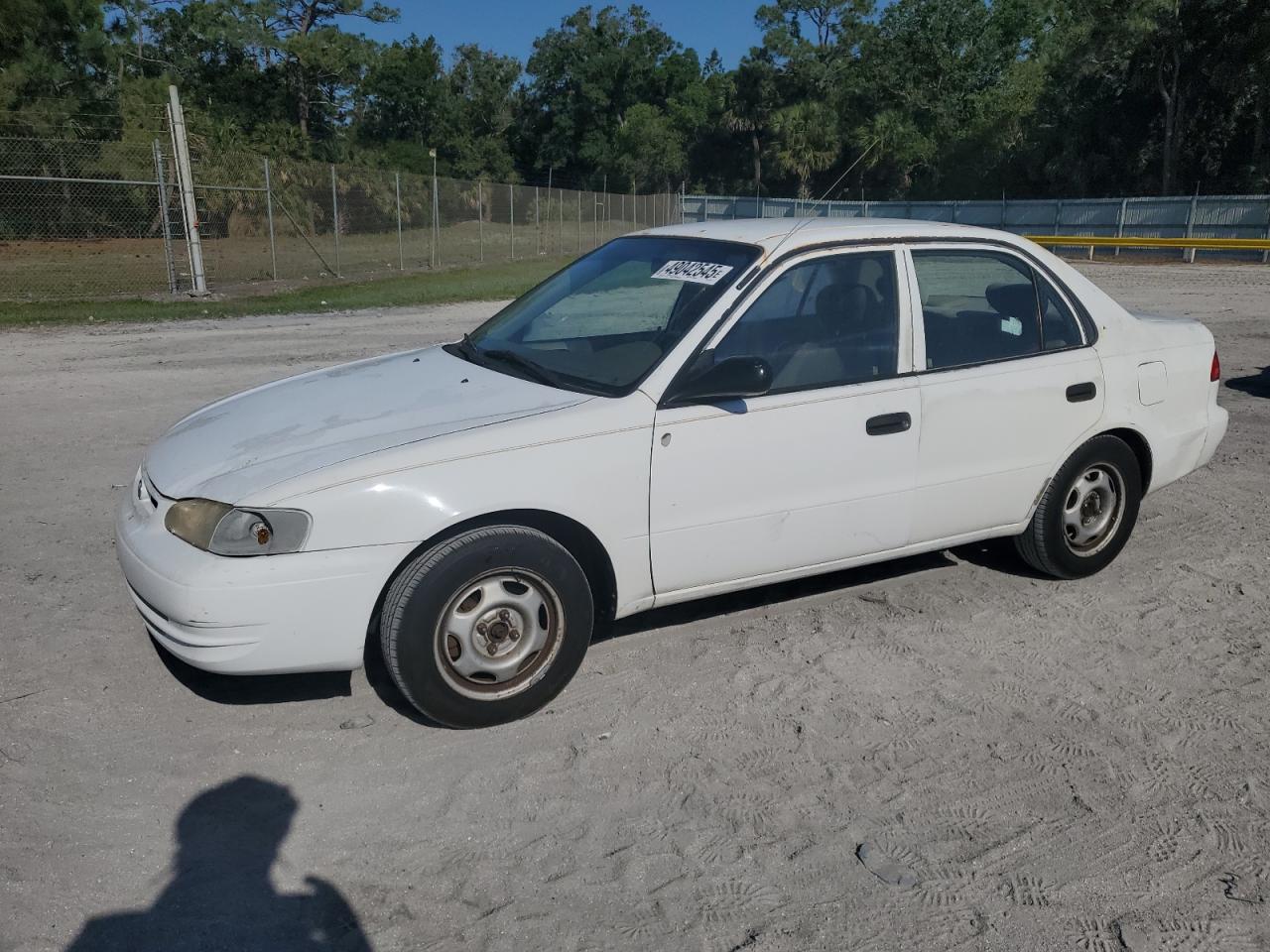 1999 Toyota Corolla Ve للبيع في Fort Pierce، FL - Side