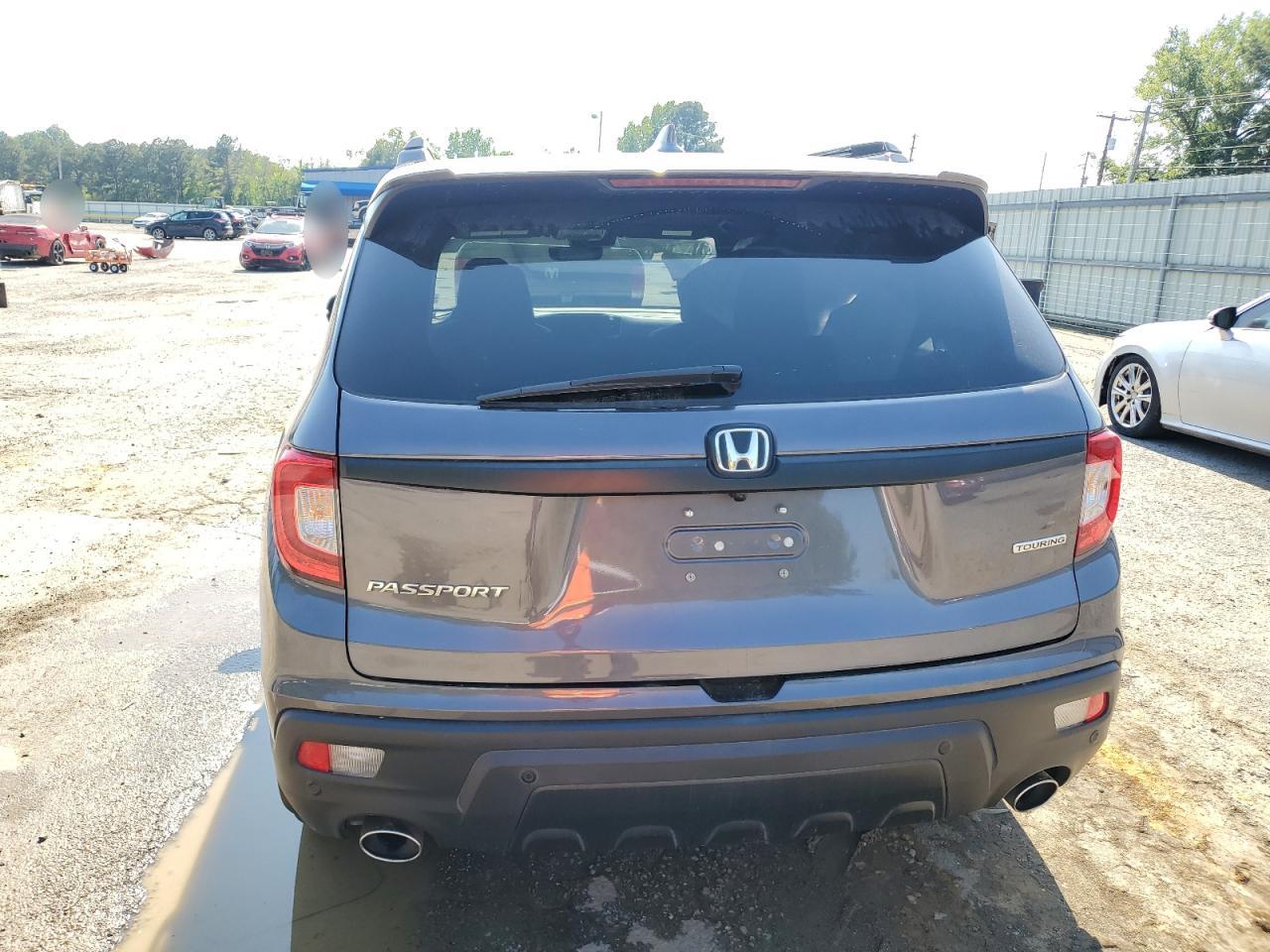 2021 Honda Passport Touring VIN: 5FNYF7H97MB011307 Lot: 52310415