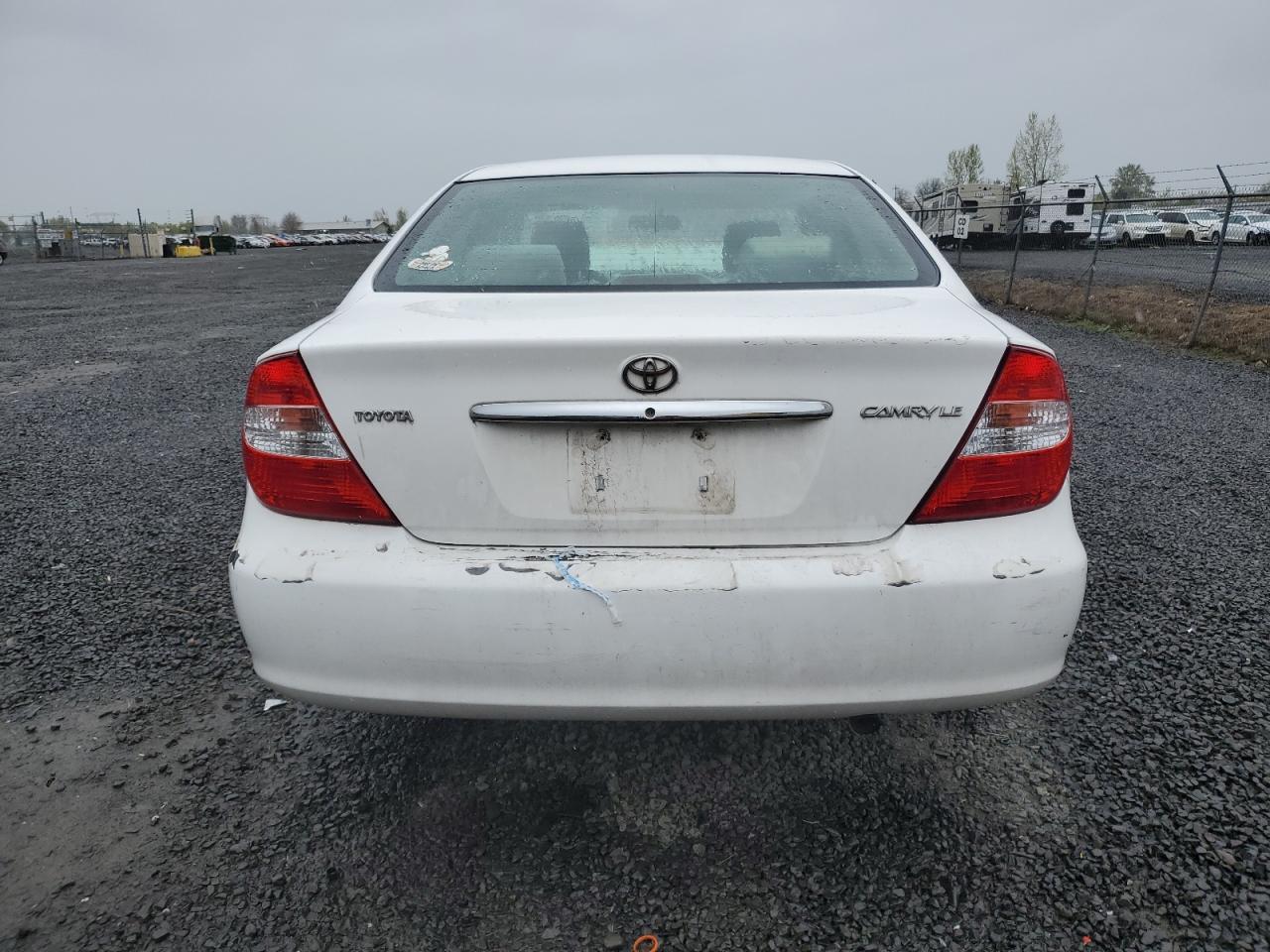 2003 Toyota Camry Le VIN: JTDBE32KX30145206 Lot: 52165395