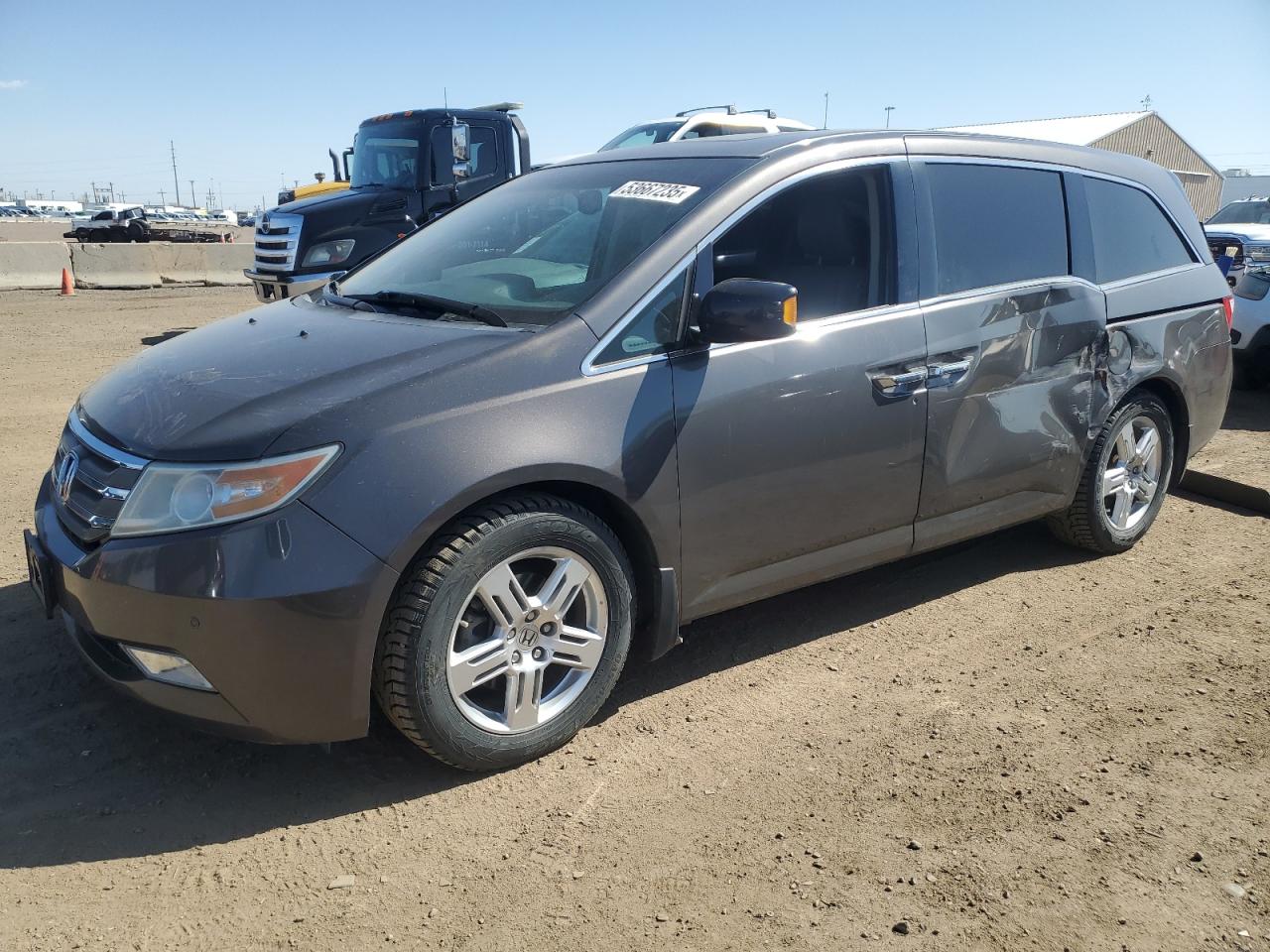 2012 Honda Odyssey Touring на продаже в Brighton, CO - Side