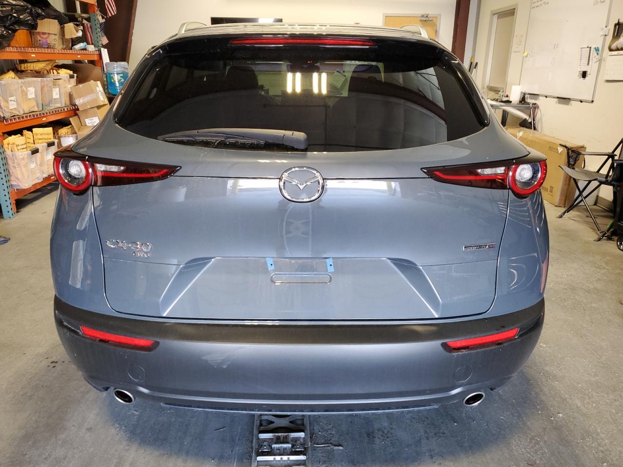 2025 MAZDA CX30 with SIDE damage, VIN 3MVDMBCM0SM809688