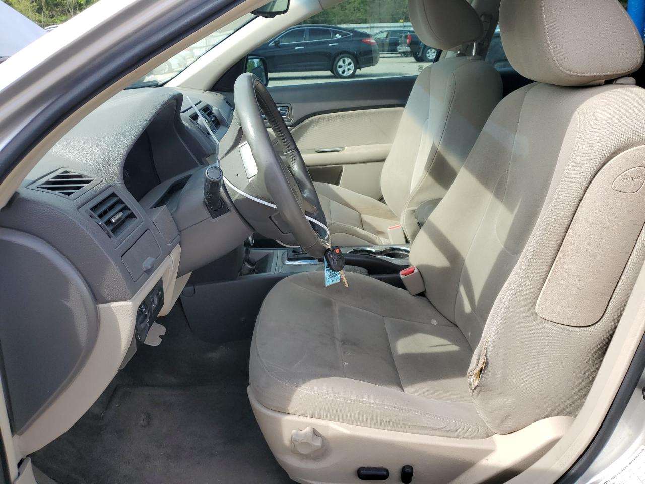 2010 Ford Fusion Hybrid VIN: 3FADP0L39AR412573 Lot: 54019145