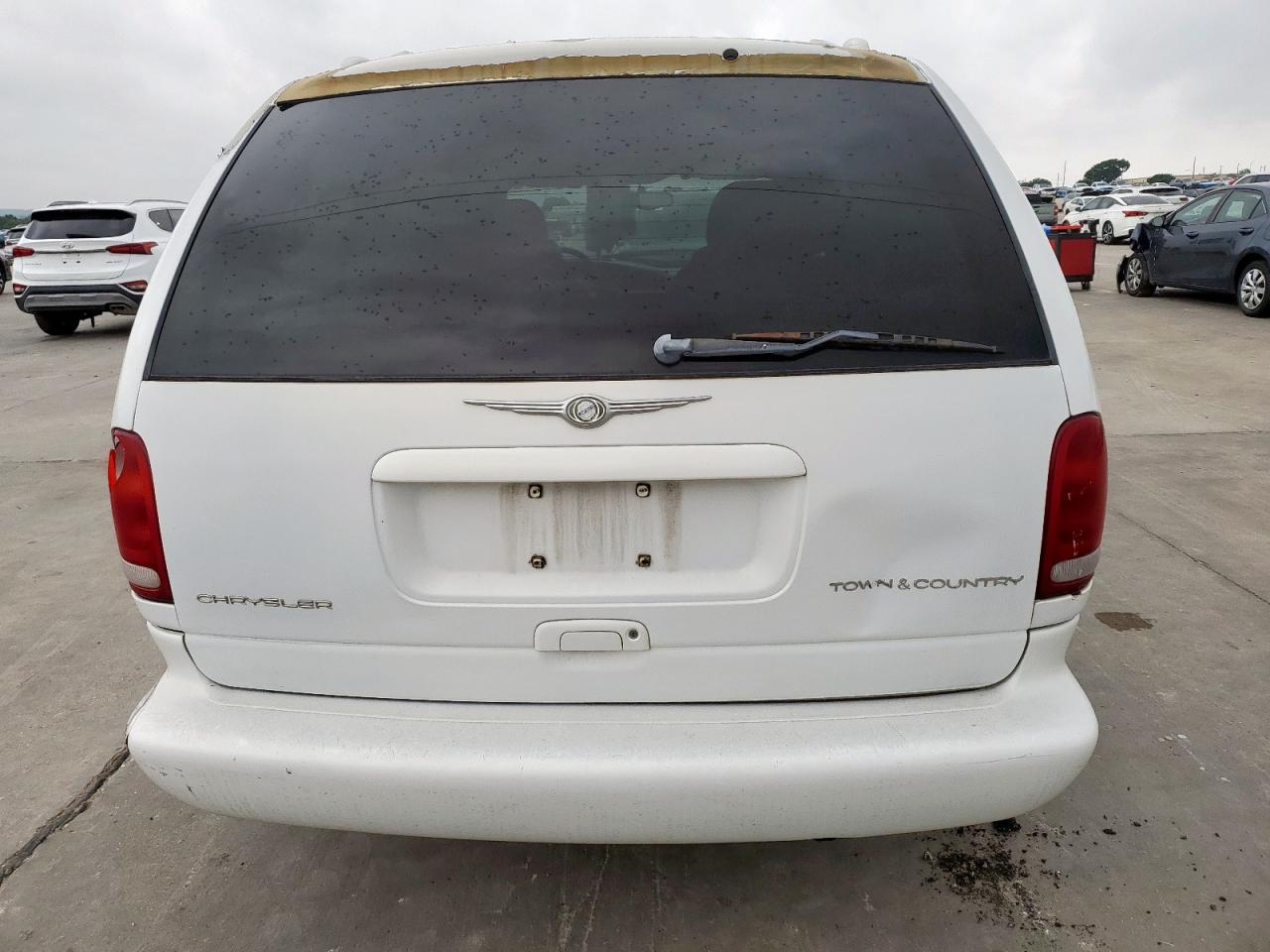 1999 Chrysler Town & Country Limited VIN: 1C4GP64LXXB696124 Lot: 55262035
